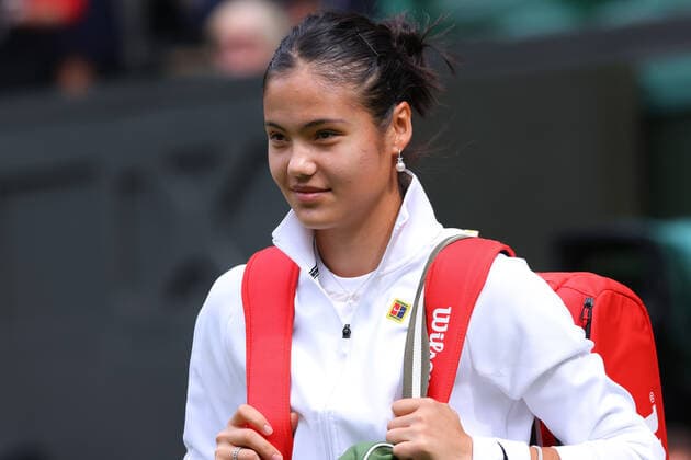 29th June 2022, All England Lawn Tennis and Croquet Club, London, England; Wimbledon Tennis tournament; Emma Raducanu walks out onto centre court for her match with Caroline Garcia in the ladies singles  ActionPlus12402945 ShaunxBrooks