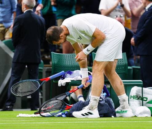 Mandatory Credit: Photo by Javier Garcia Shutterstock (13008249kc) Andy Murray strikes his tennis racquets after defeat in his second round match Wimbledon Tennis Championships, Day 3, The All England Lawn Tennis and Croquet Club, London, UK - 29 Jun 2022 Wimbledon Tennis Championships, Day 3, The All England Lawn Tennis and Croquet Club, London, UK - 29 Jun 2022  Copyright: xJavierxGarcia Shutterstockx 13008249kc