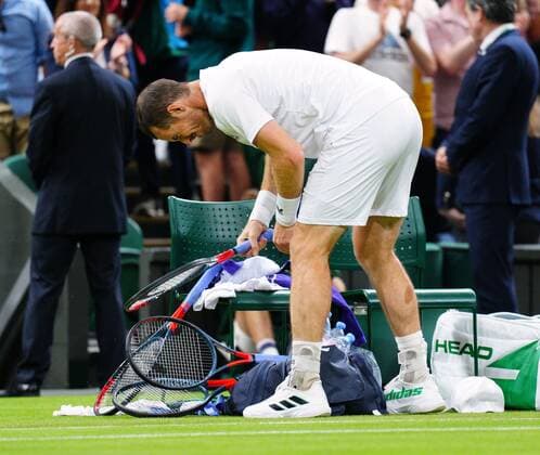 Mandatory Credit: Photo by Javier Garcia Shutterstock (13008249kq) Andy Murray strikes his tennis racquets after defeat in his second round match Wimbledon Tennis Championships, Day 3, The All England Lawn Tennis and Croquet Club, London, UK - 29 Jun 2022 Wimbledon Tennis Championships, Day 3, The All England Lawn Tennis and Croquet Club, London, UK - 29 Jun 2022  Copyright: xJavierxGarcia Shutterstockx 13008249kq