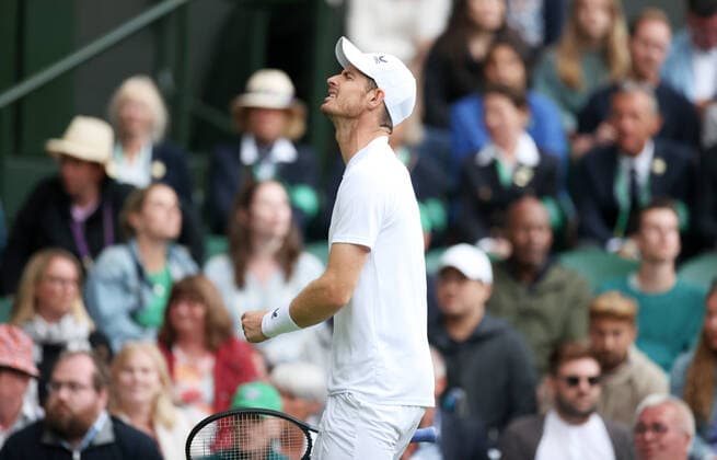 (220630) -- LONDON, June 30, 2022 -- Andy Murray of Britain reacts during the men s singles 2nd round match against John Isner of the United States at Wimbledon Tennis Championship in London, Britain, June 29, 2022. ) (SP)BRITAIN-LONDON-TENNIS-WIMBLEDON LixYing 