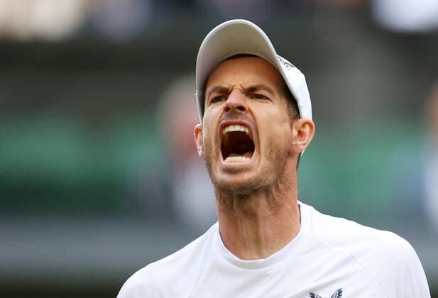 (220630) -- LONDON, June 30, 2022 -- Andy Murray of Britain reacts during the men s singles 2nd round match against John Isner of the United States at Wimbledon Tennis Championship in London, Britain, June 29, 2022. ) (SP)BRITAIN-LONDON-TENNIS-WIMBLEDON LixYing 