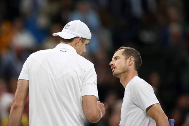 (220630) -- LONDON, June 30, 2022 -- Andy Murray (R) of Britain talks with John Isner of the United States after their men s singles 2nd round match at Wimbledon Tennis Championship in London, Britain, June 29, 2022. ) (SP)BRITAIN-LONDON-TENNIS-WIMBLEDON LixYing 