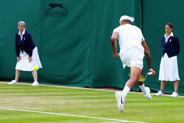 Mandatory Credit: Photo by Javier Garcia Shutterstock (13010731cd) Nick Kyrgios plays a running shot through his legs during his second round match Wimbledon Tennis Championships, Day 4, The All England Lawn Tennis and Croquet Club, London, UK - 30 Jun 2022 Wimbledon Tennis Championships, Day 4, The All England Lawn Tennis and Croquet Club, London, UK - 30 Jun 2022  Copyright: xJavierxGarcia Shutterstockx 13010731cd
