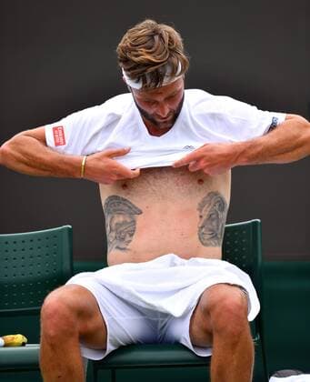 Mandatory Credit: Photo by James Veysey Shutterstock (13010732ar) Liam Broady changes his shirt during his second round match Wimbledon Tennis Championships, Day 4, The All England Lawn Tennis and Croquet Club, London, UK - 30 Jun 2022 Wimbledon Tennis Championships, Day 4, The All England Lawn Tennis and Croquet Club, London, UK - 30 Jun 2022  Copyright: xJamesxVeysey Shutterstockx 13010732ar