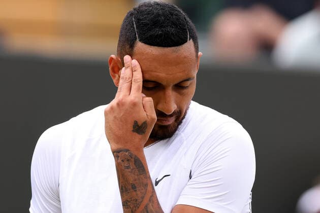 30th June 2022, All England Lawn Tennis and Croquet Club, London, England; Wimbledon Tennis tournament; Nick Kyrgios wipes his face before he serves to Filip Krajinovic in the mens singles  ActionPlus12403026 ShaunxBrooks
