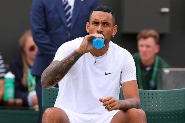 30th June 2022, All England Lawn Tennis and Croquet Club, London, England; Wimbledon Tennis tournament; Nick Kyrgios during a break in play with Filip Krajinovic in the mens singles  ActionPlus12403032 ShaunxBrooks