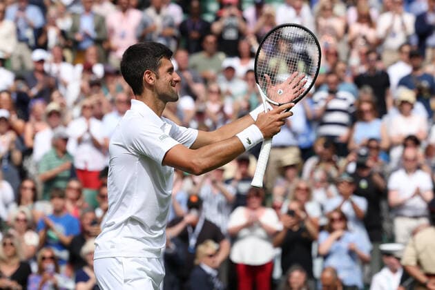 29th June 2022, All England Lawn Tennis and Croquet Club, London, England; Wimbledon Tennis tournament; Novak Djokovic celebrates after he wins the match Thanasi Kokkinakis in the mens singles  ActionPlus12403037 ShaunxBrooks