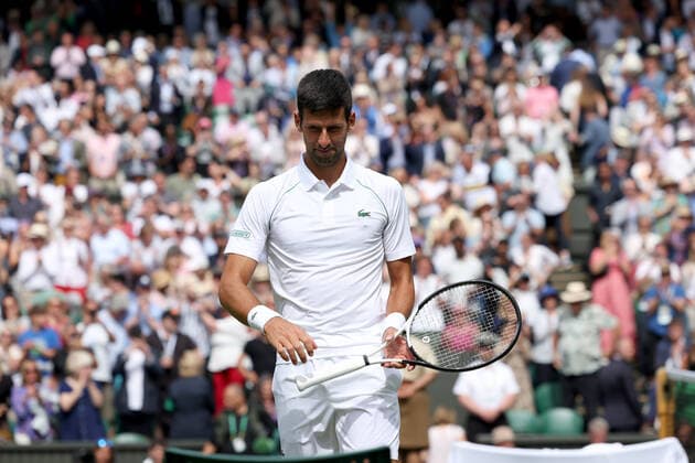 29th June 2022, All England Lawn Tennis and Croquet Club, London, England; Wimbledon Tennis tournament; Novak Djokovic prepares to leave centre court after his win against Thanasi Kokkinakis in the mens singles  ActionPlus12403038 ShaunxBrooks