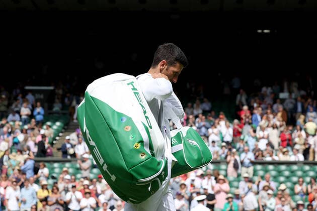 29th June 2022, All England Lawn Tennis and Croquet Club, London, England; Wimbledon Tennis tournament; Novak Djokovic prepares to leave centre court after his win against Thanasi Kokkinakis in the mens singles  ActionPlus12403040 ShaunxBrooks