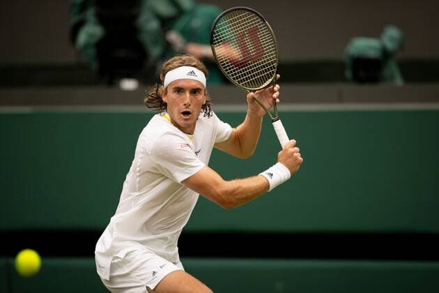 Mandatory Credit: Photo by Ella Ling Shutterstock (13010730ai) Stefanos Tsitsipas during his second round match Wimbledon Tennis Championships, Day 4, The All England Lawn Tennis and Croquet Club, London, UK - 30 Jun 2022 Wimbledon Tennis Championships, Day 4, The All England Lawn Tennis and Croquet Club, London, UK - 30 Jun 2022  Copyright: xEllaxLing Shutterstockx 13010730ai