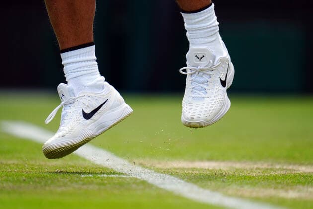 Mandatory Credit: Photo by Javier Garcia Shutterstock (13010731en) The Nike tennis shoes of Rafael Nadal Wimbledon Tennis Championships, Day 4, The All England Lawn Tennis and Croquet Club, London, UK - 30 Jun 2022 Wimbledon Tennis Championships, Day 4, The All England Lawn Tennis and Croquet Club, London, UK - 30 Jun 2022  Copyright: xJavierxGarcia Shutterstockx 13010731en