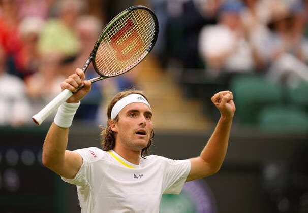 Mandatory Credit: Photo by Ella Ling Shutterstock (13010730bw) Stefanos Tsitsipas of Greece celebrates Wimbledon Tennis Championships, Day 4, The All England Lawn Tennis and Croquet Club, London, UK - 30 Jun 2022 Wimbledon Tennis Championships, Day 4, The All England Lawn Tennis and Croquet Club, London, UK - 30 Jun 2022  Copyright: xEllaxLing Shutterstockx 13010730bw
