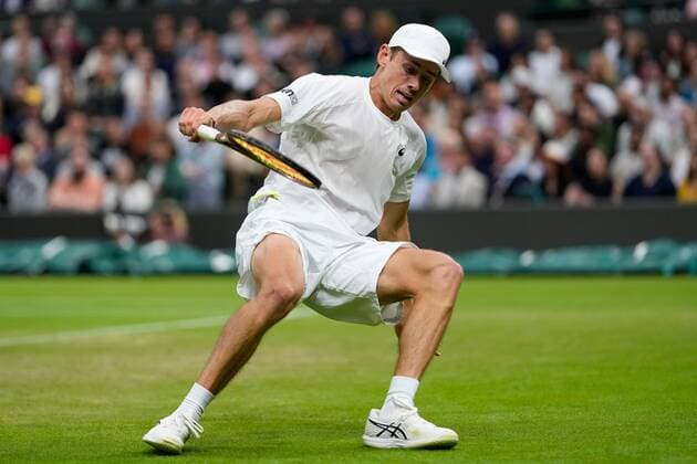 Mandatory Credit: Photo by Dave Shopland Shutterstock (13010728ek) Alex de Minaur slips during his second round match Wimbledon Tennis Championships, Day 4, The All England Lawn Tennis and Croquet Club, London, UK - 30 Jun 2022 Wimbledon Tennis Championships, Day 4, The All England Lawn Tennis and Croquet Club, London, UK - 30 Jun 2022  Copyright: xDavexShopland Shutterstockx 13010728ek