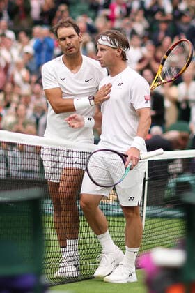 30th June 2022, All England Lawn Tennis and Croquet Club, London, England; Wimbledon Tennis tournament; Rafael Nadal shakes hands with Ricardas Berankis after his win in the mens singles  ActionPlus12403272 ShaunxBrooks