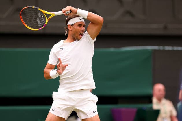 30th June 2022, All England Lawn Tennis and Croquet Club, London, England; Wimbledon Tennis tournament; Rafael Nadal plays a forehand to Ricardas Berankis in the mens singles  ActionPlus12403275 ShaunxBrooks