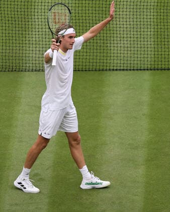(220701) -- LONDON, July 1, 2022 -- Stefanos Tsitsipas celebrates after winning the men s singles second round match between Stefanos Tsitsipas of Greece and Jordan Thompson of Australia at Wimbledon Tennis Championship in London, Britain, on June 30, 2022. ) (SP)BRITAIN-LONDON-TENNIS-WIMBLEDON-MEN S SINGLES HanxYan 