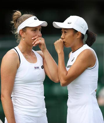 (220701) -- LONDON, July 1, 2022 -- Zhang Shuai (R) Elise Mertens communicate during the women s doubles first round match between Zhang Shuai (China) Elise Mertens (Belgium) and Anna Bondar (Hungary) Greet Minnen (Belgium) at Wimbledon Tennis Championship in London, Britain, on June 30, 2022. ) (SP)BRITAIN-LONDON-TENNIS-WIMBLEDON HanxYan 