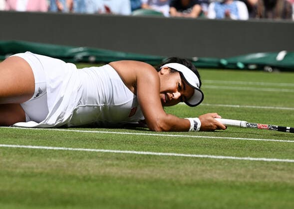 nChampionships - Week One - Day Two (Friday) - All England Lawn Tennis Club, Wimbledon - Friday 1st July 2022 Heather Watson Kaja Juvan (SLO) Heather Watson of Great Britain slips on the grass 