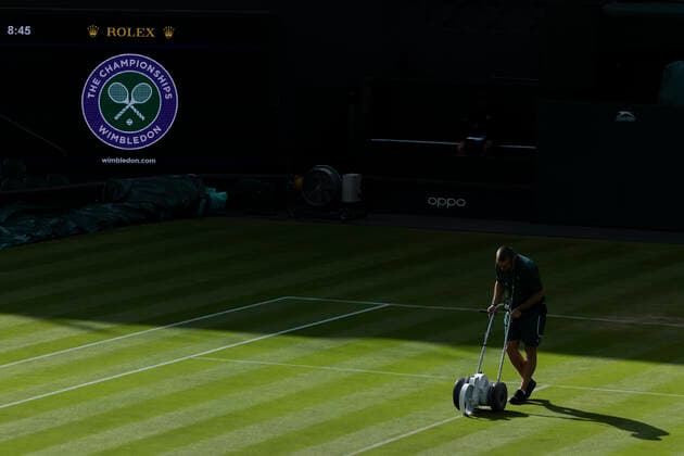 1st July 2022, All England Lawn Tennis and Croquet Club, London, England; Wimbledon Tennis tournament; Wimbledon grounds staff work on centre court  ActionPlus12403305 ShaunxBrooks