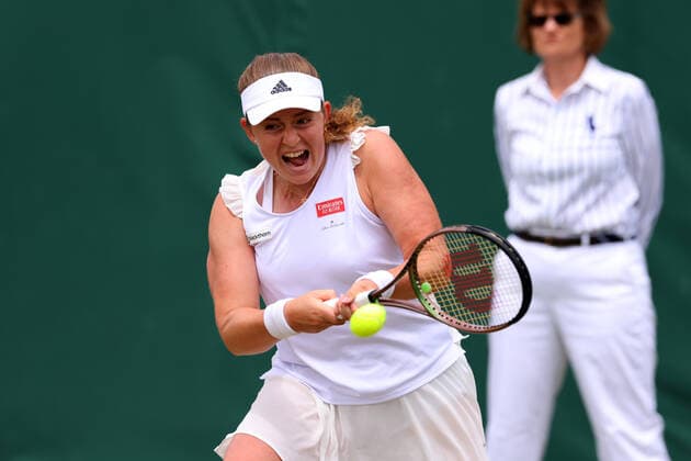 1st July 2022, All England Lawn Tennis and Croquet Club, London, England; Wimbledon Tennis tournament; Jelena Ostapenko plays a backhand to Irina-Camelia Begu in the womens singles  ActionPlus12403319 ShaunxBrooks