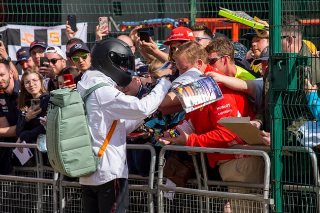 1st July 2022, Silverstone Circuit, Silverstone, Northamptonshire, England: British F1 Grand Prix, free practise day: Haas F1 Team driver Mick Schumacher signs fans autographs  ActionPlus12403433 TimxWilliams