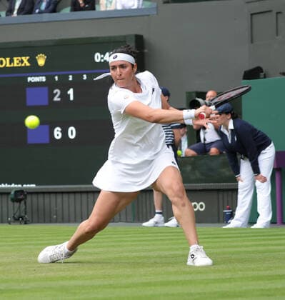 Tunisian Ons Jabeur in action in her third round match against France s Diane Parry on day five of the 2022 Wimbledon championships in London on Friday, July 01, 2022. Jabeur won the match 6-2,6-3.  LON202207010444 HUGOxPHILPOTT