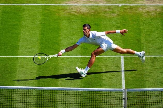 Mandatory Credit: Photo by Javier Garcia Shutterstock (13012399ck) Novak Djokovic during his third round match Wimbledon Tennis Championships, Day 5, The All England Lawn Tennis and Croquet Club, London, UK - 01 Jul 2022 Wimbledon Tennis Championships, Day 5, The All England Lawn Tennis and Croquet Club, London, UK - 01 Jul 2022  Copyright: xJavierxGarcia Shutterstockx 13012399ck