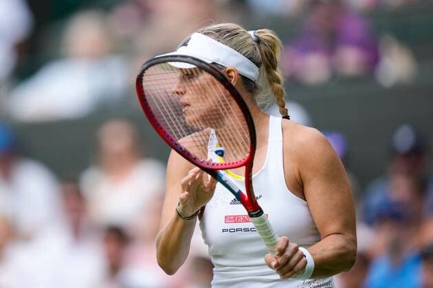 Mandatory Credit: Photo by Dave Shopland Shutterstock (13010735ca) Angelique Kerber during her third round match Wimbledon Tennis Championships, Day 5, The All England Lawn Tennis and Croquet Club, London, UK - 01 Jul 2022 Wimbledon Tennis Championships, Day 5, The All England Lawn Tennis and Croquet Club, London, UK - 01 Jul 2022  Copyright: xDavexShopland Shutterstockx 13010735ca