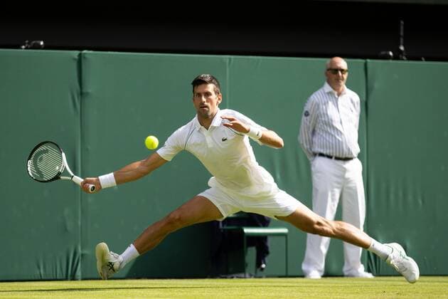 Mandatory Credit: Photo by Ella Ling Shutterstock (13012398cn) Novak Djokovic during his third round match Wimbledon Tennis Championships, Day 5, The All England Lawn Tennis and Croquet Club, London, UK - 01 Jul 2022 Wimbledon Tennis Championships, Day 5, The All England Lawn Tennis and Croquet Club, London, UK - 01 Jul 2022  Copyright: xEllaxLing Shutterstockx 13012398cn