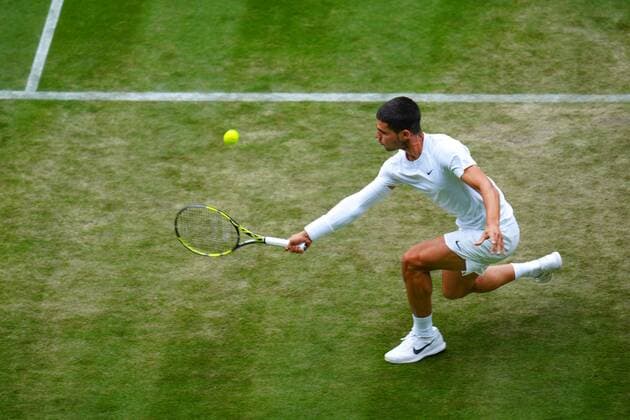 Mandatory Credit: Photo by Javier Garcia Shutterstock (13012399do) Carlos Alcaraz during his third round match Wimbledon Tennis Championships, Day 5, The All England Lawn Tennis and Croquet Club, London, UK - 01 Jul 2022 Wimbledon Tennis Championships, Day 5, The All England Lawn Tennis and Croquet Club, London, UK - 01 Jul 2022  Copyright: xJavierxGarcia Shutterstockx 13012399do