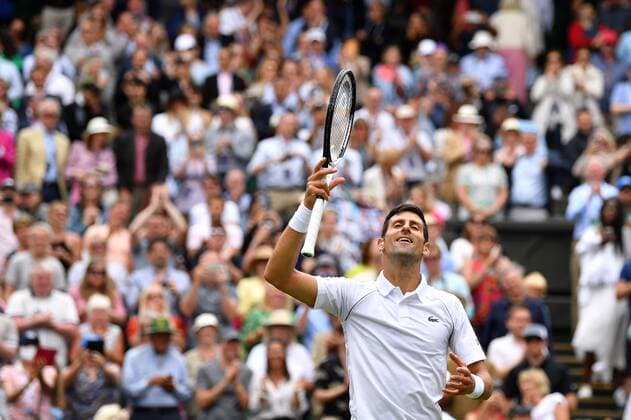 Mandatory Credit: Photo by James Veysey Shutterstock (13012400cr) Novak Djokovic celebrates victory in his third round match Wimbledon Tennis Championships, Day 5, The All England Lawn Tennis and Croquet Club, London, UK - 01 Jul 2022 Wimbledon Tennis Championships, Day 5, The All England Lawn Tennis and Croquet Club, London, UK - 01 Jul 2022  Copyright: xJamesxVeysey Shutterstockx 13012400cr
