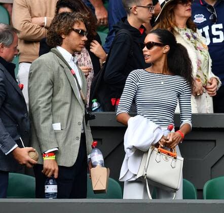 Mandatory Credit: Photo by James Veysey Shutterstock (13012400da) Elias Balthasar Becker and Lilian de Carvalho on Centre Court Wimbledon Tennis Championships, Day 5, The All England Lawn Tennis and Croquet Club, London, UK - 01 Jul 2022 Wimbledon Tennis Championships, Day 5, The All England Lawn Tennis and Croquet Club, London, UK - 01 Jul 2022  Copyright: xJamesxVeysey Shutterstockx 13012400da