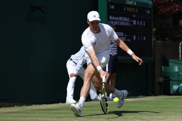 1st July 2022, All England Lawn Tennis and Croquet Club, London, England; Wimbledon Tennis tournament; Botic Van De Zandschulp plays a forehand to John Peers and Filip Polasek in the mens doubles  ActionPlus12403508 ShaunxBrooks