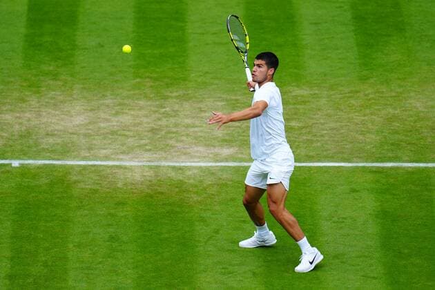 Mandatory Credit: Photo by Javier Garcia Shutterstock (13012399dy) Carlos Alcaraz during his third round match Wimbledon Tennis Championships, Day 5, The All England Lawn Tennis and Croquet Club, London, UK - 01 Jul 2022 Wimbledon Tennis Championships, Day 5, The All England Lawn Tennis and Croquet Club, London, UK - 01 Jul 2022  Copyright: xJavierxGarcia Shutterstockx 13012399dy
