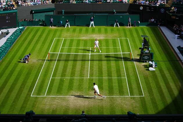 Mandatory Credit: Photo by Javier Garcia Shutterstock (13012399ef) Carlos Alcaraz and Oscar Otte during their third round match Wimbledon Tennis Championships, Day 5, The All England Lawn Tennis and Croquet Club, London, UK - 01 Jul 2022 Wimbledon Tennis Championships, Day 5, The All England Lawn Tennis and Croquet Club, London, UK - 01 Jul 2022  Copyright: xJavierxGarcia Shutterstockx 13012399ef