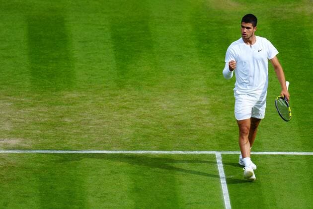 Mandatory Credit: Photo by Javier Garcia Shutterstock (13012399ek) Carlos Alcaraz celebrates winning the first set during his third round match Wimbledon Tennis Championships, Day 5, The All England Lawn Tennis and Croquet Club, London, UK - 01 Jul 2022 Wimbledon Tennis Championships, Day 5, The All England Lawn Tennis and Croquet Club, London, UK - 01 Jul 2022  Copyright: xJavierxGarcia Shutterstockx 13012399ek