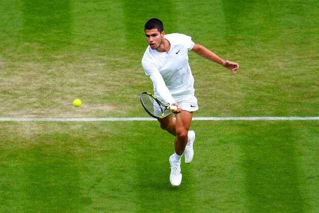 Mandatory Credit: Photo by Javier Garcia Shutterstock (13012399er) Carlos Alcaraz during his third round match Wimbledon Tennis Championships, Day 5, The All England Lawn Tennis and Croquet Club, London, UK - 01 Jul 2022 Wimbledon Tennis Championships, Day 5, The All England Lawn Tennis and Croquet Club, London, UK - 01 Jul 2022  Copyright: xJavierxGarcia Shutterstockx 13012399er