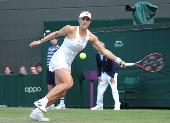 Angelique Kerber (GER) returns a shot to Elise Mertens (BEL) during the Womens Singles Third Round Match on No.1 Court on Day 5 of The Championships Wimbledon 2022 at All England Lawn Tennis and Croquet Club on July 1, 2022 in London, England.  Copyright: xx