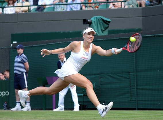 Angelique Kerber (GER) returns a shot to Elise Mertens (BEL) during the Womens Singles Third Round Match on No.1 Court on Day 5 of The Championships Wimbledon 2022 at All England Lawn Tennis and Croquet Club on July 1, 2022 in London, England.  Copyright: xx