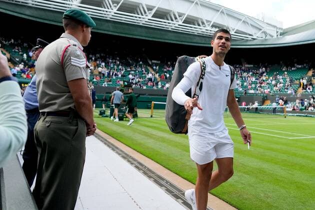 Mandatory Credit: Photo by Dave Shopland Shutterstock (13010735em) Carlos Alcaraz walks off court after winning his third round match Wimbledon Tennis Championships, Day 5, The All England Lawn Tennis and Croquet Club, London, UK - 01 Jul 2022 Wimbledon Tennis Championships, Day 5, The All England Lawn Tennis and Croquet Club, London, UK - 01 Jul 2022  Copyright: xDavexShopland Shutterstockx 13010735em
