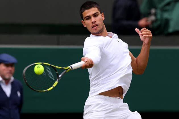 Ist July 2022, All England Lawn Tennis and Croquet Club, London, England; Wimbledon Tennis tournament; Carlos Alcaraz plays a forehand to Oscar Otte in the mens singles  ActionPlus12403742 ShaunxBrooks