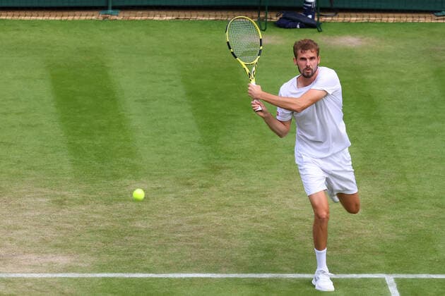 Ist July 2022, All England Lawn Tennis and Croquet Club, London, England; Wimbledon Tennis tournament; Oscar Otte plays a backhand to Carlos Alcaraz in the mens singles  ActionPlus12403753 ShaunxBrooks