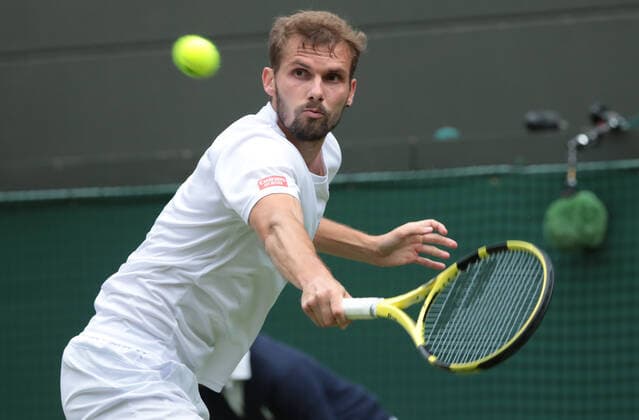 Oscar Otte (GER) returns a shot to Carlos Alcaraz (ESP) during the Mens Singles Third Round Match on No.1 Court on Day 5 of The Championships Wimbledon 2022 at All England Lawn Tennis and Croquet Club on July 1, 2022 in London, England.  Copyright: xx