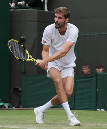 Oscar Otte (GER) returns a shot to Carlos Alcaraz (ESP) during the Mens Singles Third Round Match on No.1 Court on Day 5 of The Championships Wimbledon 2022 at All England Lawn Tennis and Croquet Club on July 1, 2022 in London, England.  Copyright: xx