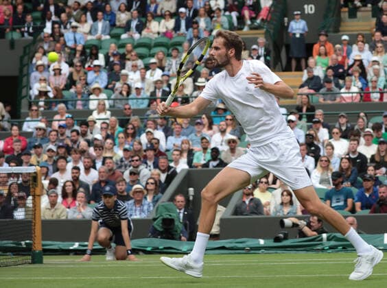 Oscar Otte (GER) returns a shot to Carlos Alcaraz (ESP) during the Mens Singles Third Round Match on No.1 Court on Day 5 of The Championships Wimbledon 2022 at All England Lawn Tennis and Croquet Club on July 1, 2022 in London, England.  Copyright: xx