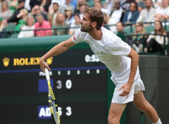 Oscar Otte (GER) returns a shot to Carlos Alcaraz (ESP) during the Mens Singles Third Round Match on No.1 Court on Day 5 of The Championships Wimbledon 2022 at All England Lawn Tennis and Croquet Club on July 1, 2022 in London, England.  Copyright: xx