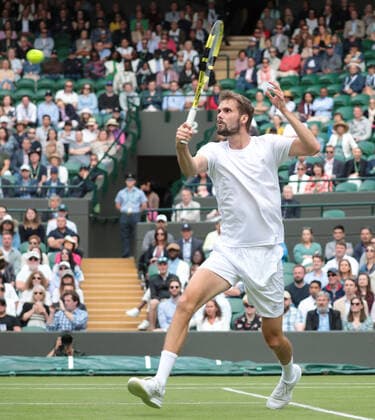 Oscar Otte (GER) returns a shot to Carlos Alcaraz (ESP) during the Mens Singles Third Round Match on No.1 Court on Day 5 of The Championships Wimbledon 2022 at All England Lawn Tennis and Croquet Club on July 1, 2022 in London, England.  Copyright: xx