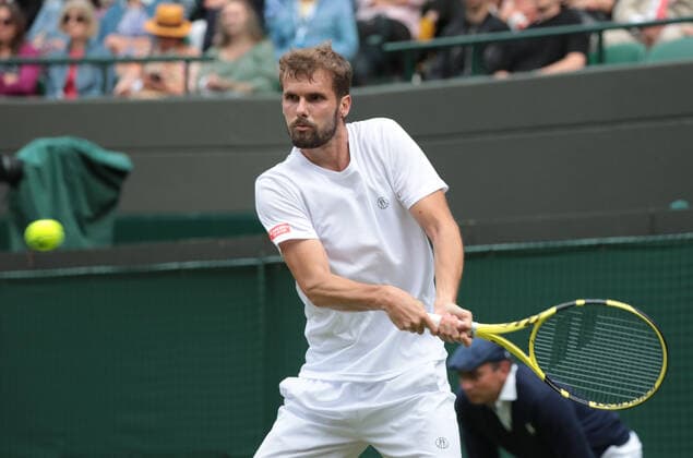 Oscar Otte (GER) returns a shot to Carlos Alcaraz (ESP) during the Mens Singles Third Round Match on No.1 Court on Day 5 of The Championships Wimbledon 2022 at All England Lawn Tennis and Croquet Club on July 1, 2022 in London, England.  Copyright: xx