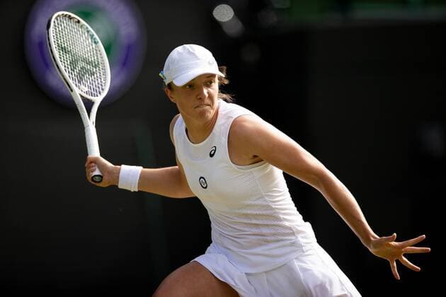 Mandatory Credit: Photo by Ella Ling Shutterstock (13012401bi) Iga Swiatek during her third round match Wimbledon Tennis Championships, Day 6, The All England Lawn Tennis and Croquet Club, London, UK - 02 Jul 2022 Wimbledon Tennis Championships, Day 6, The All England Lawn Tennis and Croquet Club, London, UK - 02 Jul 2022  Copyright: xEllaxLing Shutterstockx 13012401bi