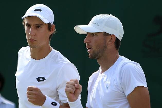 Great Britain, London, All England Lawn Tennis Club, The Championships Wimbledon 2022 - DAY 6- 02 07 2022 Belgian player Joran Vliegen and his doubles partner Jackson Withrow (USA) pictured during their second round double match in London , All England Lawn Tennis Club at The Championships Wimbledon 2022 The Championships Wimbledon 2022- DAY 6- 02 07 2022 PhotoNews Panoramic 